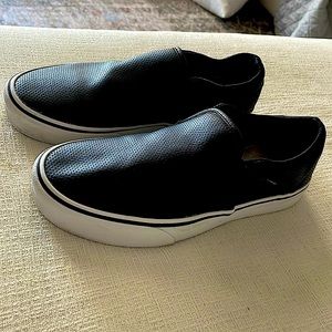 VANS women’s perforated black vans